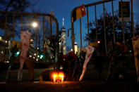 <p>A makeshift memorial for victims of Tuesday’s attack is seen outside a police barricade on the bike path next to West Street, a day after a man driving a rented pickup truck mowed down pedestrians and cyclists on a bike path alongside the Hudson River in New York City, in New York, Nov. 1, 2017. (Photo: Shannon Stapleton/Reuters) </p>