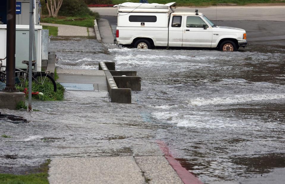 January 15, 2022: Water from a tsunami caused by an underground volcano near Tonga hits the Small Craft Harbor in Santa Cruz, Calif.