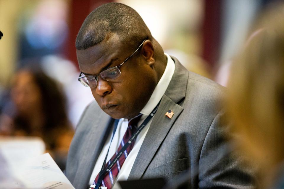 County Administrator John Gibbs looks through papers as he attends Ottawa County's Board of Commissioners meeting Tuesday, Jan. 10, 2023, at the Ottawa County Offices. 