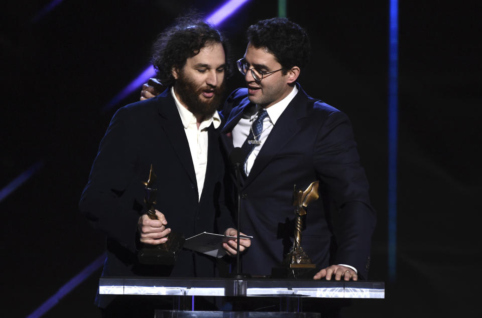 Josh Safdie, left, and Ben Safdie accept the award for best director for "Uncut Gems" at the 35th Film Independent Spirit Awards on Saturday, Feb. 8, 2020, in Santa Monica, Calif. (AP Photo/Chris Pizzello)