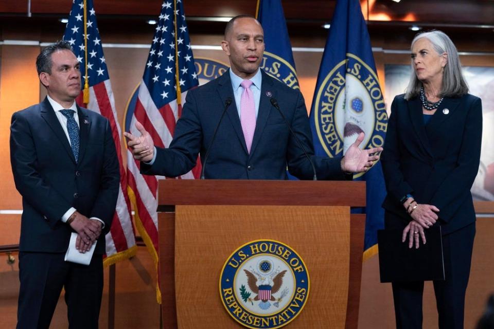 Rep. Hakeem Jeffries, D-N.Y., joined by Rep. Pete Aguilar, D-Calif., left, and Rep. Katherine Clark, D-Mass., speak after they were elected by House Democrats to form the new leadership when speaker of the House Nancy Pelosi, D-Calif., steps aside.