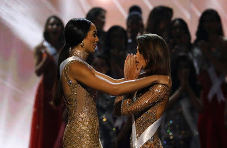 Miss France Iris Mittenaere reacts after being declared winner in the Miss Universe beauty pageant at the Mall of Asia Arena, in Pasay, Metro Manila, Philippines January 30, 2017. REUTERS/Erik De Castro