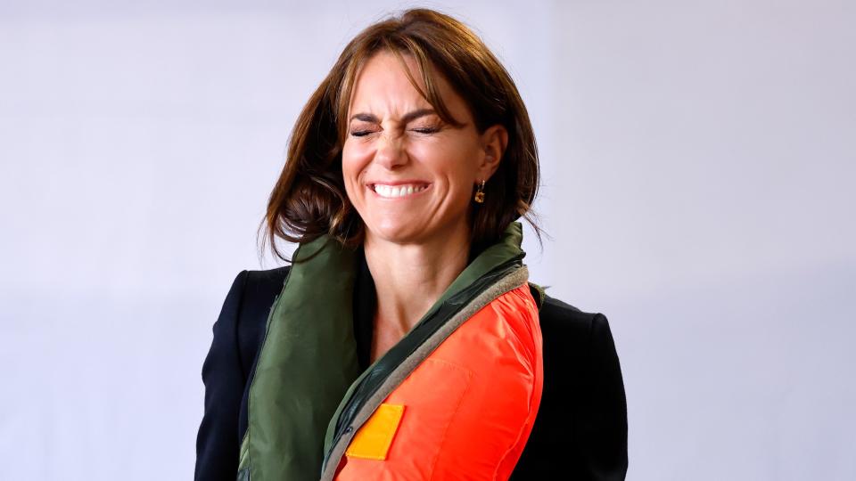 <p> In 2023, while showing off her new side-swept bangs, Kate did her best to keep her composure as she participated in emergency training drills. </p> <p> The Princess of Wales' hilarious reactions were caught as the team inflated an emergency life jacket while conducting a training exercise with Royal Navy Survival Equipment Technicians during a visit to the Royal Naval Air Station in Yeovil. It followed her appointment by King Charles as the new Commodore-in-Chief of the Fleet Air Arm. </p> <p> We're not sure we wouldn't find it bizarre having a life vest inflated around our necks, so Kate's cheeky grin is relatable. </p>
