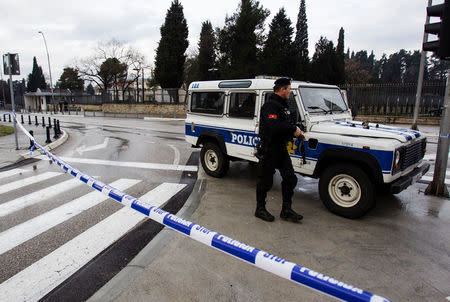 Police guard the United States embassy building in Podgorica, Montenegro, February 22, 2018. REUTERS/Stevo Vasiljevic