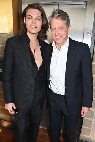 <p>Dave Benett/WireImage</p> Damian Hurley and Hugh Grant on May 8