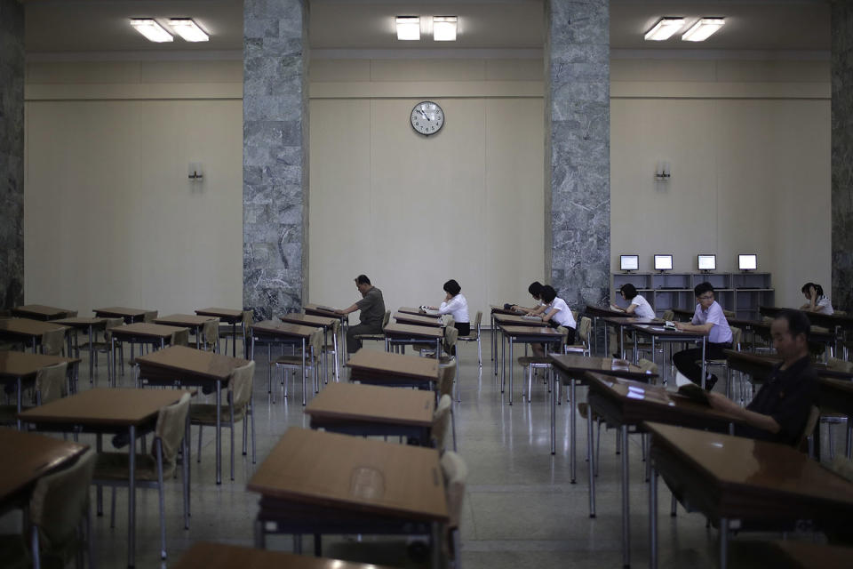 <p>People read at the Grand People’s Study House on July 24, 2017, in Pyongyang, North Korea. The building is situated on Kim Il Sung Square and serves as the central library where North Koreans also go to for language classes such as English, Chinese German and Japanese. (Photo: Wong Maye-E/AP) </p>