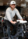 <p>Chris Lane surprises a SoulCycle class during a country-themed ride in Boston, Mass. on Jan. 13. </p>