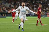 <p>Gareth Bale celebrates his acrobatic bicycle kick goal which gave Real Madrid a 2-1 lead over Liverpool in the Champions League final in Kiev. The Wales forward came off the substitutes’ bench to score twice and earn Real a third successive European Cup (Nick Potts/PA). </p>