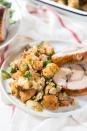 <p>Looking for a stuffing that's bursting with flavor, textures and heartiness? This slightly sweet pear, sage, and sausage stuffing is just what you need. </p><p>Get the <strong><a href="https://www.theflavorbender.com/pear-sage-and-sausage-stuffing/" rel="nofollow noopener" target="_blank" data-ylk="slk:Pear, Sage and Sausage Stuffing recipe;elm:context_link;itc:0;sec:content-canvas" class="link ">Pear, Sage and Sausage Stuffing recipe</a></strong> at The Flavor Bender.</p>