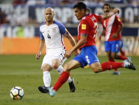 Sep 1, 2017; Harrison, NJ, USA; United States midfielder Michael Bradley (4) defends against Costa Rica defender Johnny Acosta (2) during first half at Red Bull Arena. Noah K. Murray-USA TODAY Sports