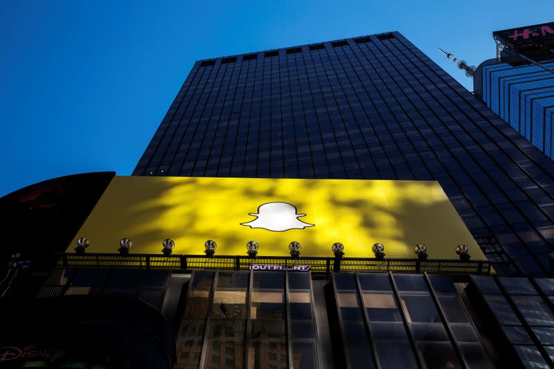 FILE PHOTO: A billboard displays the logo of Snapchat above Times Square in New York