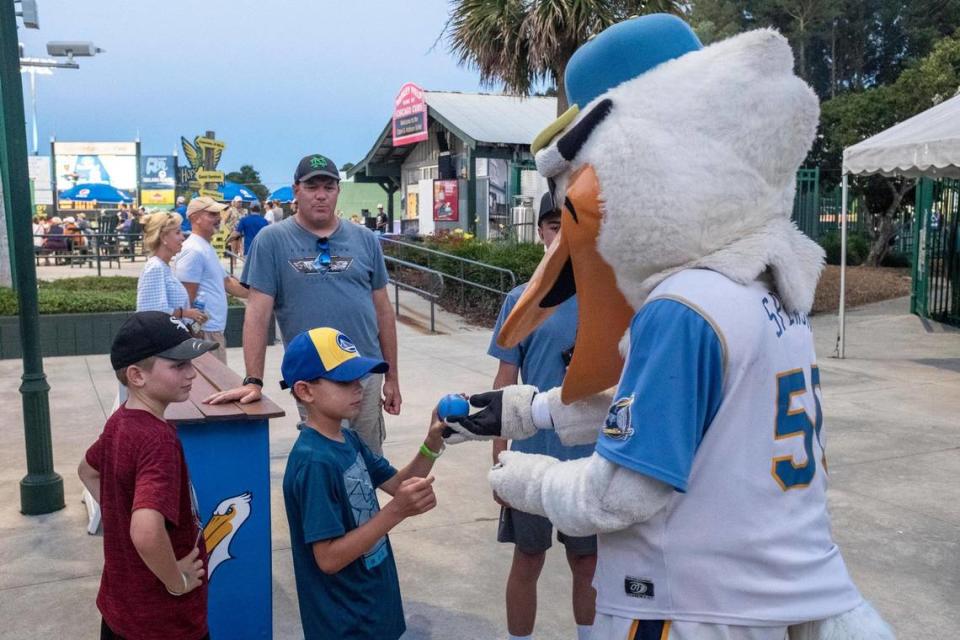 At Ticketreturn.com Field, the Myrtle Beach Pelicans attract fans by providing food and entertainment options beyond the baseball game. June 30, 2021.