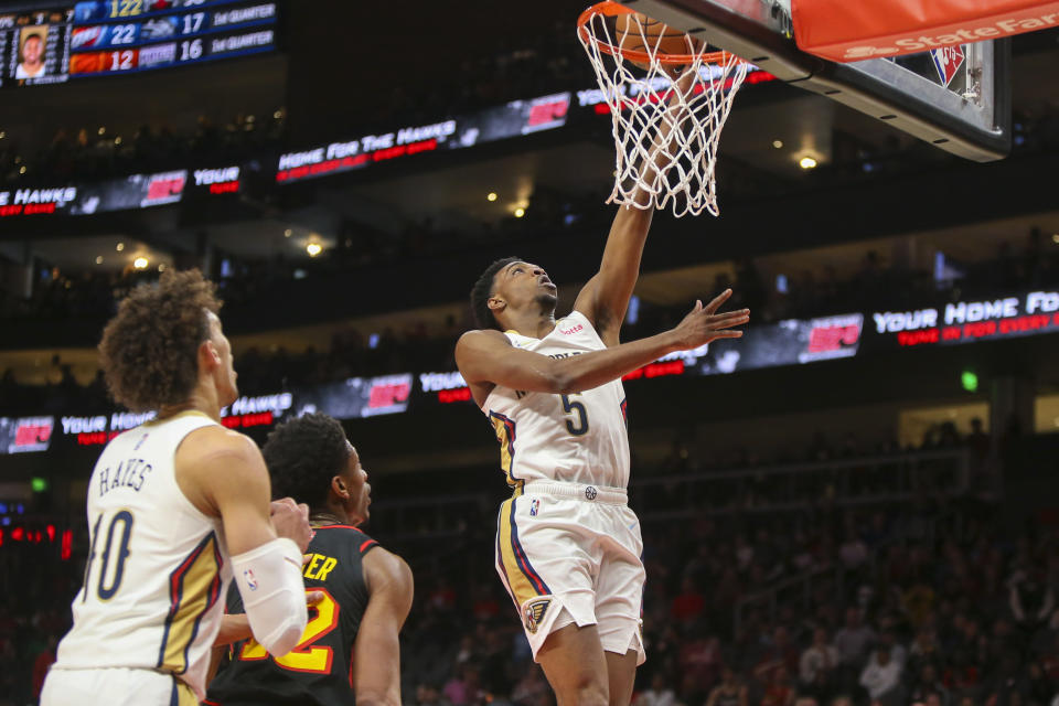 New Orleans Pelicans forward Herbert Jones (5) shoots in the first half of an NBA basketball game against the Atlanta Hawks, Sunday, March 20, 2022, in Atlanta. (AP Photo/Brett Davis)