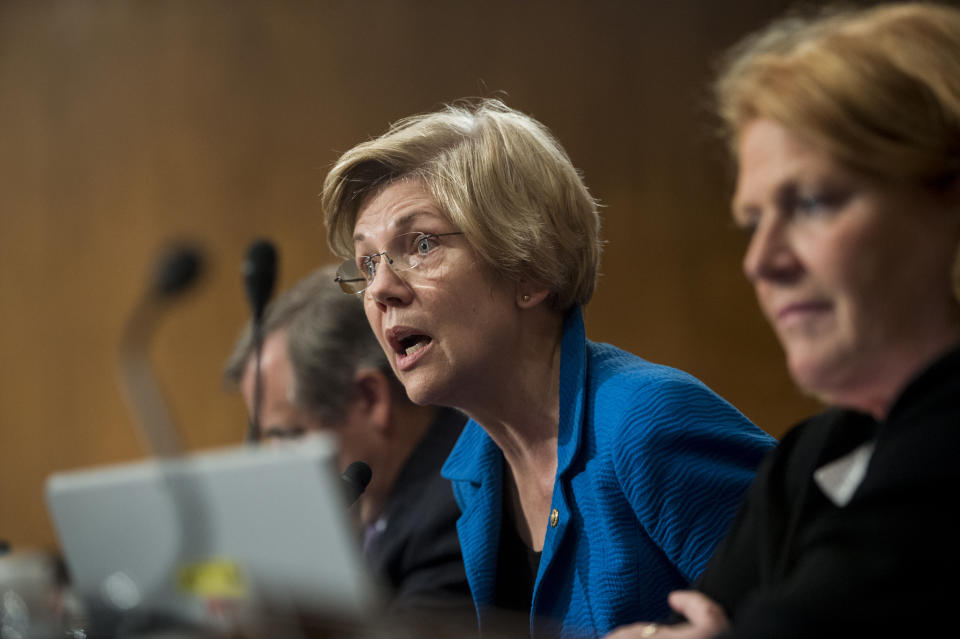 UNITED STATES - JULY 15: Sen. Elizabeth Warren, D-Mass., questions Consumer Financial Protection Bureau Director Richard Cordray during the Senate Banking, Housing and Urban Affairs Committee hearing on the CFPB's semi-annual report to Congress on Wednesday, July 15, 2015. (Photo By Bill Clark/CQ Roll Call)