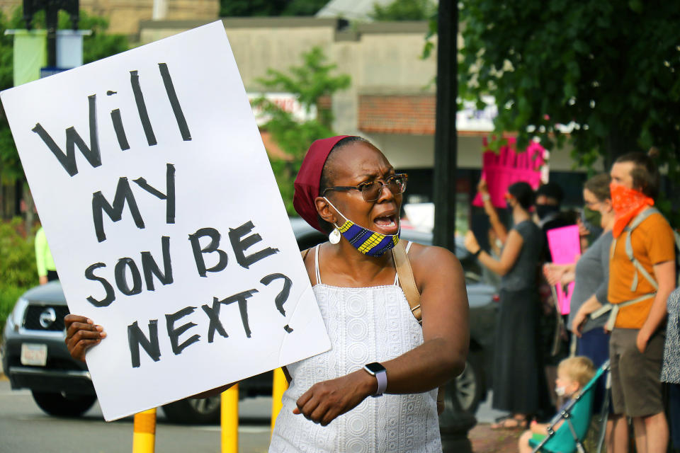 BOSTON, MA - JUNE 4: Leandrea Brantle from Roslindale holds a sign asking "Will my son be next?" at A Silent Vigil for Black Lives in Adams Park in Boston on June 4, 2020. Protesters gather calling for justice for George Floyd and other Black Americans killed by police officers on the day of Floyd's funeral. (Photo by John Tlumacki/The Boston Globe via Getty Images)