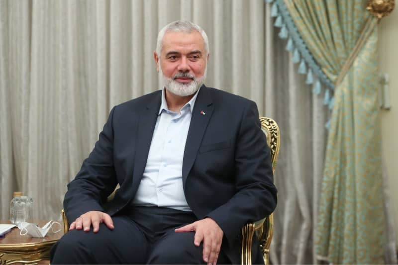 A photo provided by the Iranian Presidency shows Ismail Haniyeh, chairman of the politburo of the Palestinian Hamas movement, meeting Ebrahim Raisi (not pictured), president of Iran, at the presidential palace in Tehran. Hamas leader Ismail Haniyeh arrived in Cairo on Tuesday for talks with Egyptian officials on a ceasefire in the Gaza Strip, Hamas said. -/Iranian Presidency/dpa