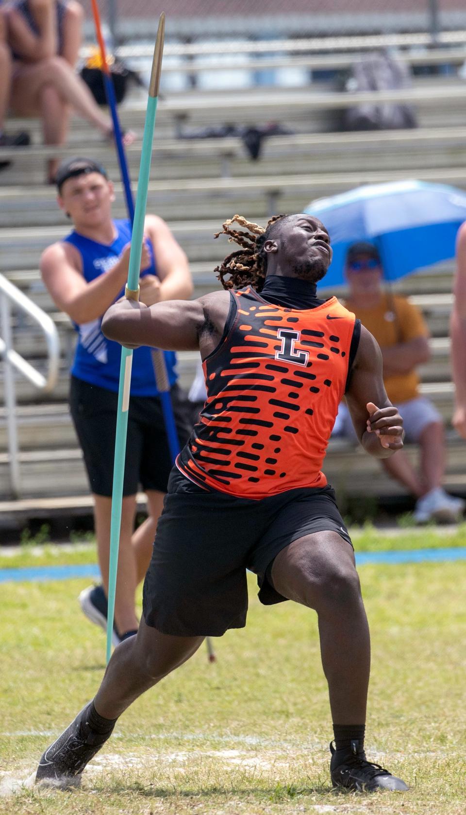 Lakeland senior Micheal Walker competes in the boys javelin on Saturday at the Class 3A, District 8 track and field meet at Lake Region High School.