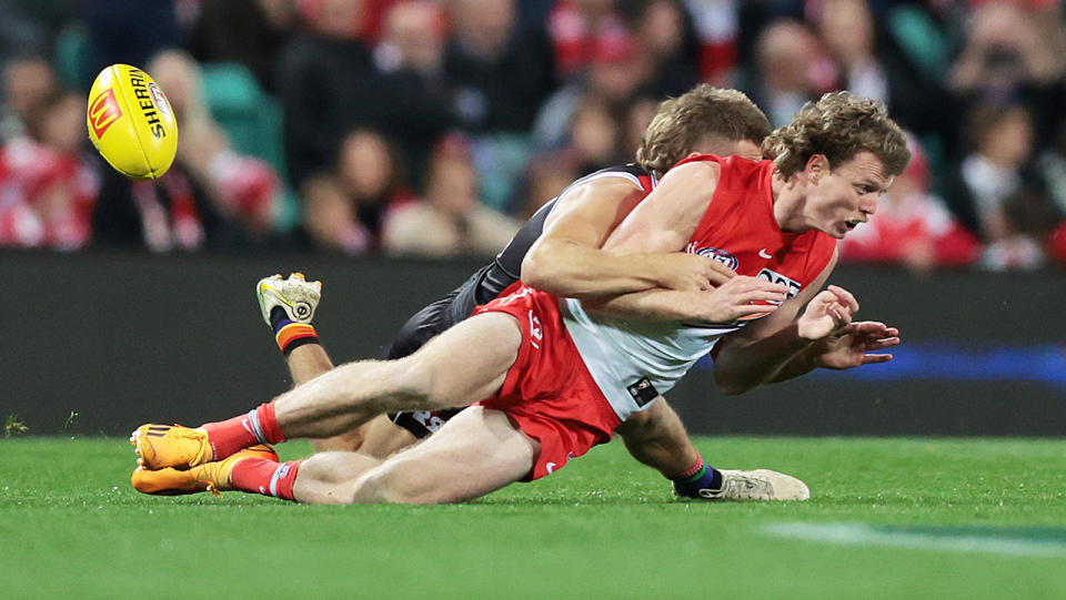 St Kilda's Dan Butler was cleared by the AFL tribunal after initially copping a one-match ban for this tackle on Sydney's Nick Blakey. (Photo by Mark Metcalfe/AFL Photos/via Getty Images )