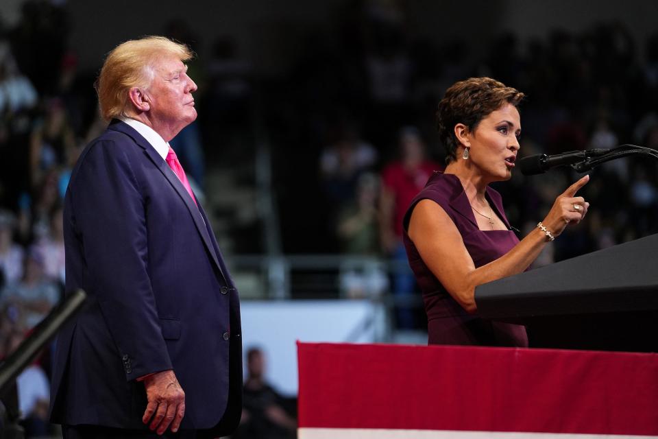 Kari Lake, candidate for Arizona governor,  speaks after being invited onstage by former President Donald Trump during a Save America rally at the Findlay Toyota Center on  July 22, 2022, in Prescott Valley.