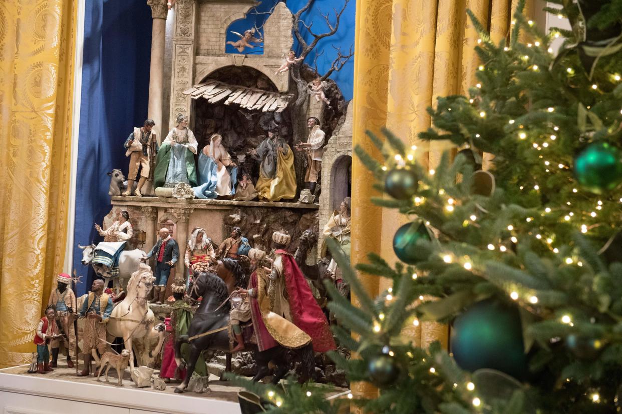A Nativity scene and Christmas trees are seen during a preview of holiday decorations in the East Room of the White House, Nov. 27, 2017 (Photo: SAUL LOEB via Getty Images)