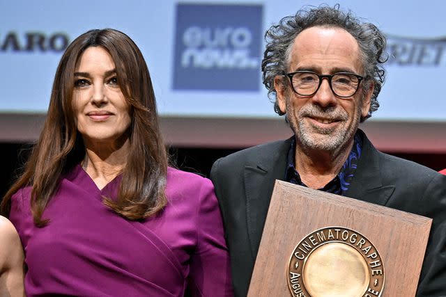 <p>Franck Castel/ABACAPRESS.COM / SplashNews.com</p> Monica Bellucci and Tim Burton at the Lumière Film Festival on Oct. 21, 2022