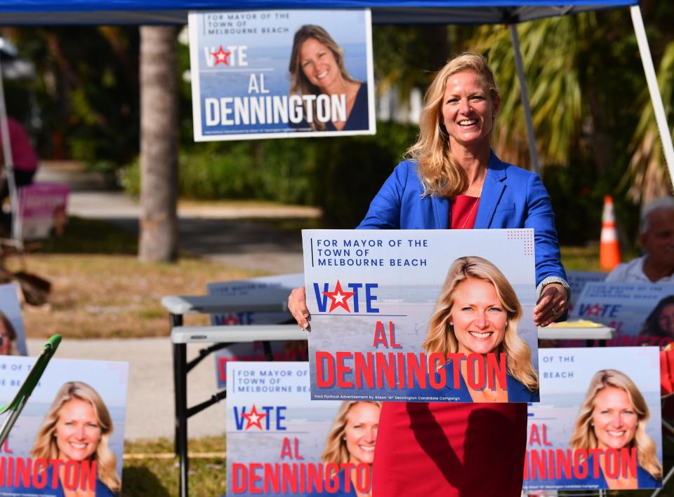 Alison "Al" Dennington was campaigning Tuesday morning on Ocean Avenue in Melbourne Beach. Dennington won the election for mayor, defeating Joyce Barton.