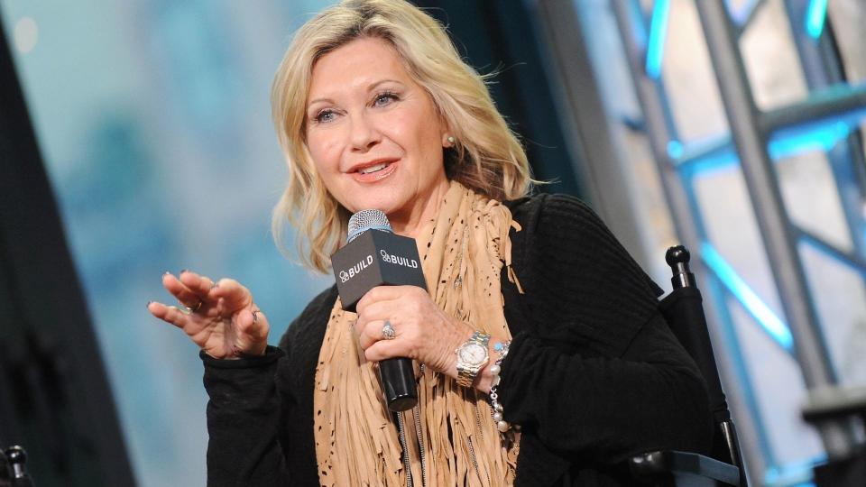 Olivia Newton-John is urging critics to 'relax' amid claims that 