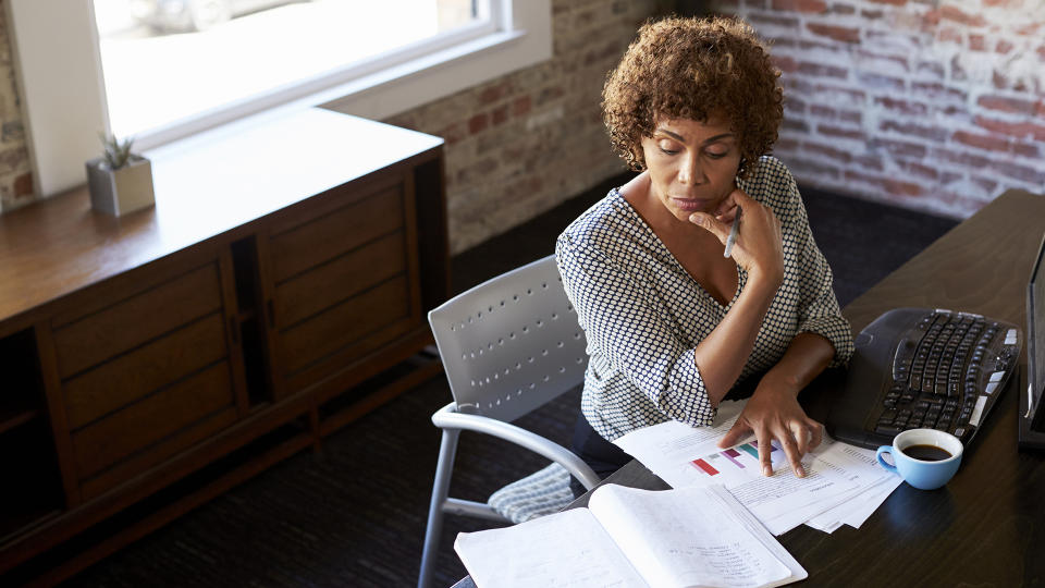 Mature Businesswoman Working In Office.