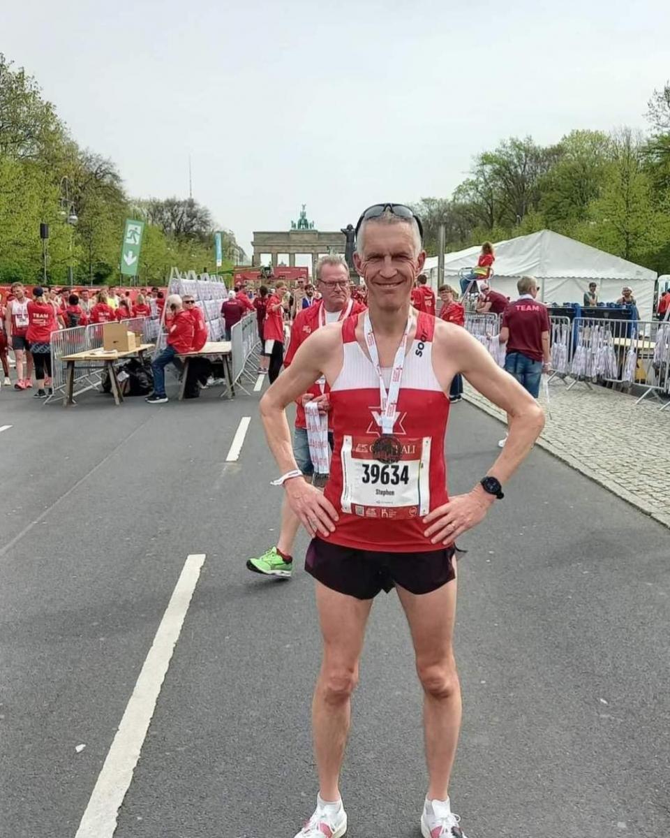 Warrington Guardian: Steve Watmough at the finish line of the Berlin half-marathon