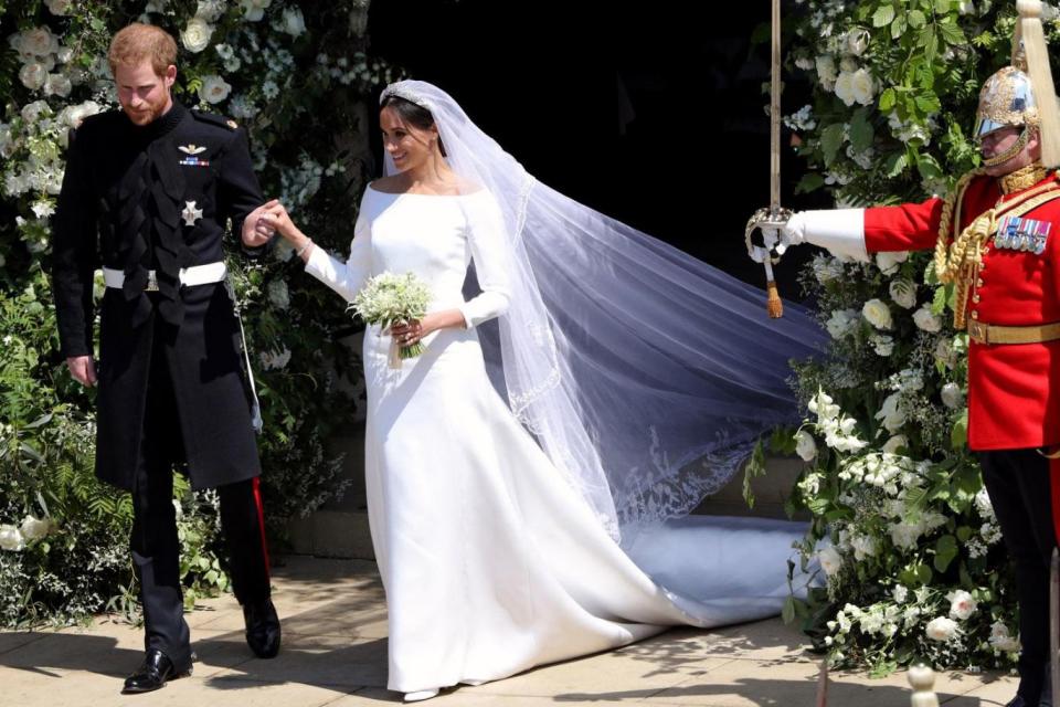 Meghan emerges from St George's Chapel with Prince Harry (Getty Images)