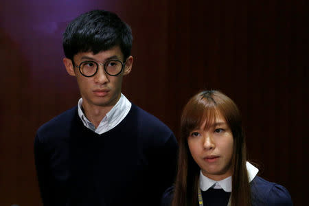 Pro-independence legislator-elects Yau Wai-ching (R) and Baggio Leung meet reporters after the president of the legislature delayed the swearing-in of the two in Hong Kong, China October 25, 2016. REUTERS/Bobby Yip