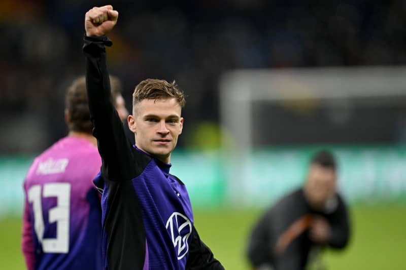 Germany's Joshua Kimmich gestures as he leaves the pitch jubilant following the international friendly soccer match between Germany and Netherlands at Deutsche Bank Park. Kimmich has been confirmed as the latest German Euro 2024 squad member, by actor Wolfgang Bahro. Arne Dedert/dpa