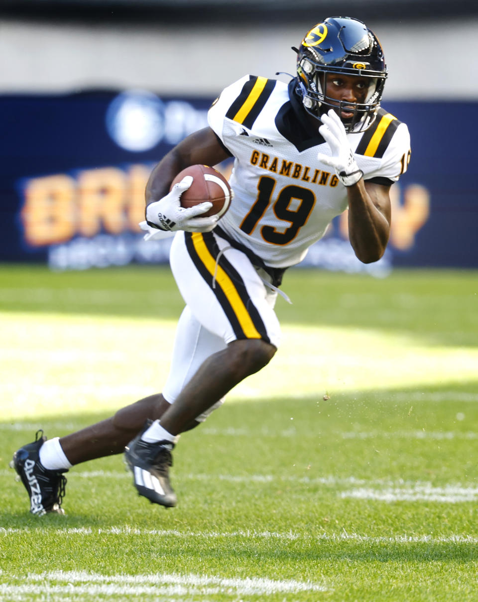 Grambling State wide receiver Antonio Jones (19) runs after a catch against Hampton during the first half of an NCAA college football game, Saturday, Sept. 2, 2023, in Harrison, N.J. (AP Photo/Noah K. Murray)