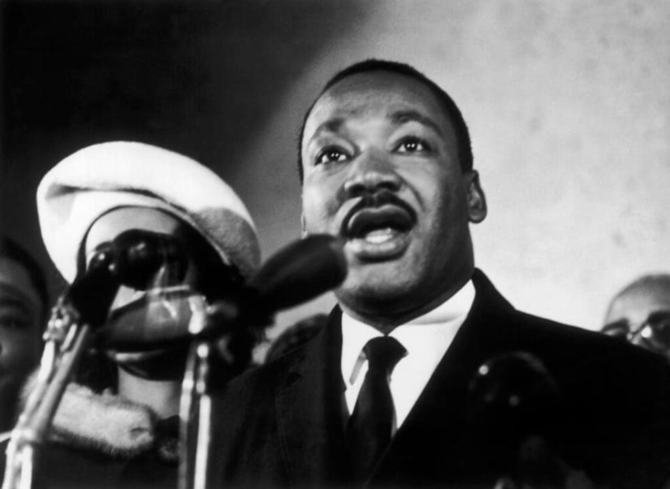 The Reverend Martin Luther King Jr., Leader Of The Civil Rights Movement, Giving A Press Conference Between 1961 And 1968. His Wife Coretta Is Partially Pictured On The Left, Half-Hidden By The Microphone. (Photo by Keystone-France/Gamma-Keystone via Getty Images)