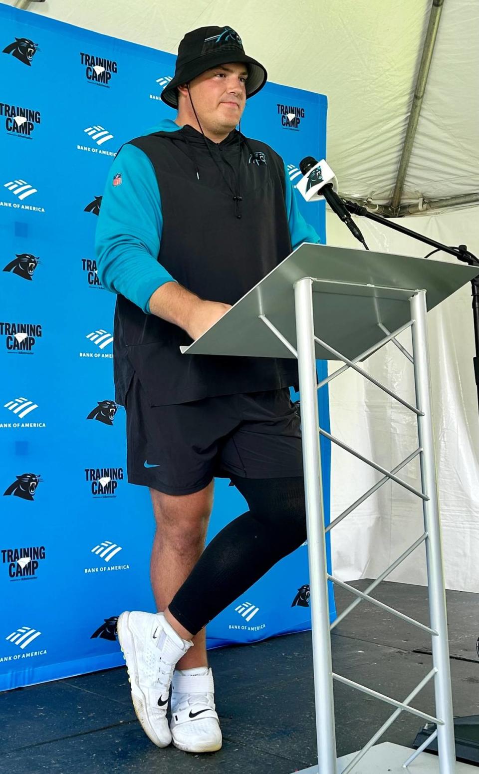 Carolina Panthers offensive guard Austin Corbett answers questions from the media on Sunday, Aug. 6, 2023. Corbett has missed all of training camp so far due to the after-effects of a serious left knee injury.