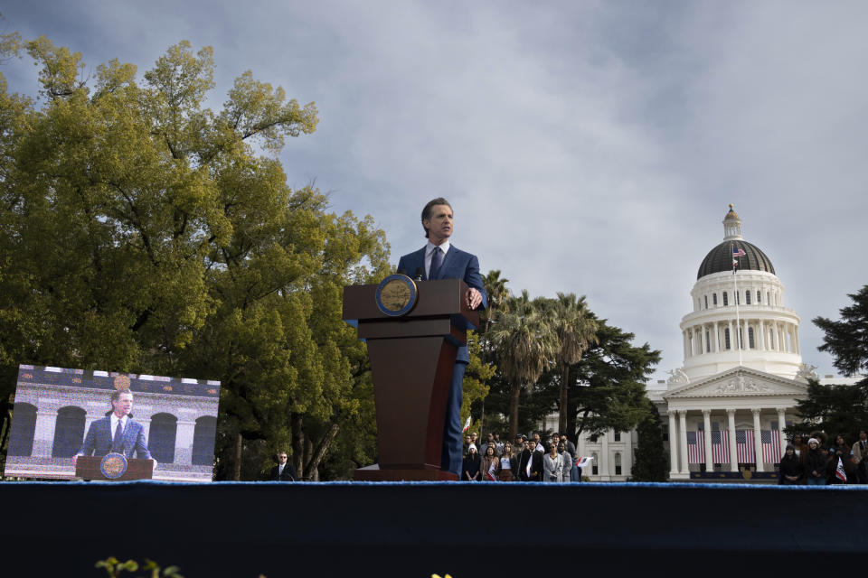 CORRECTS SPELLING OF SURNAME TO NEWSOM - Governor Gavin Newsom speaks during his inauguration in the Plaza de California in Sacramento, Calif., Friday, Jan. 6, 2023. (AP Photo/José Luis Villegas)