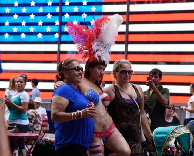 Pop star parades New York City in a bra