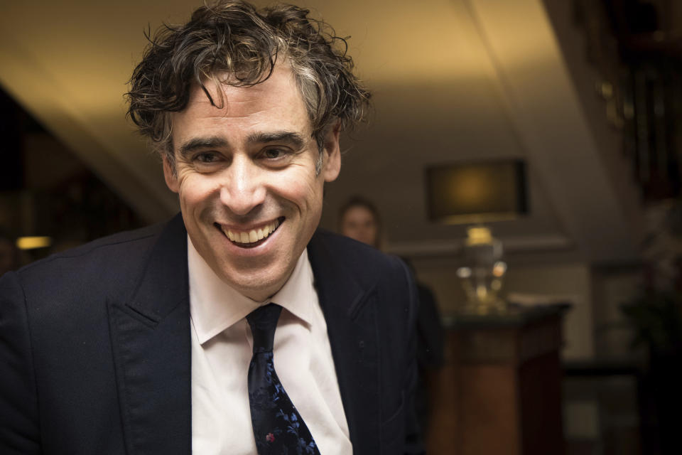 Actor Stephen Mangan poses for photographers upon arrival at the Women in Film and TV Awards, in London, Friday, Dec. 7, 2018. (Photo by Vianney Le Caer/Invision/AP)