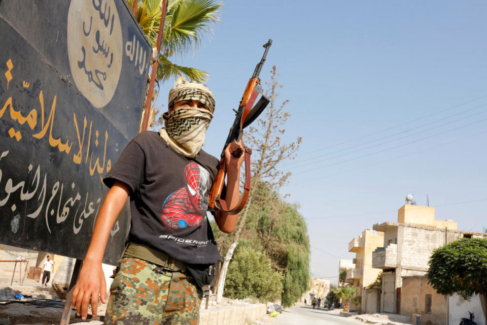 A member of Turkish-backed Free Syrian Army (FSA) patrols in the border town of Jarablus