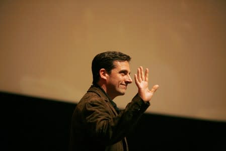 FILE PHOTO: Steve Carell waves as he walks on stage for an "Inside The Office" panel discussion at the Leonard H. Goldenson theatre in North Hollywood