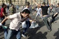 Egyptian anti-Mubarak protesters demonstrate in Cairo's Tahrir square