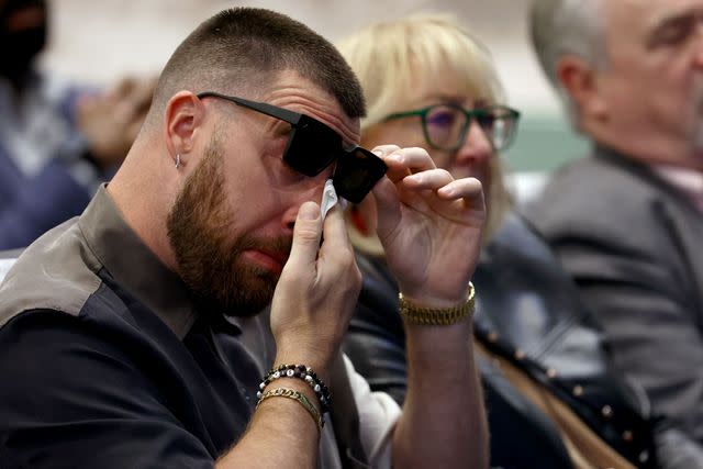 <p>Tim Nwachukwu/Getty</p> Travis Kelce #87 of the Kansas City Chiefs reacts during his brother, Jason's, retirement from the NFL at NovaCare Complex on March 04, 2024 in Philadelphia, Pennsylvania.