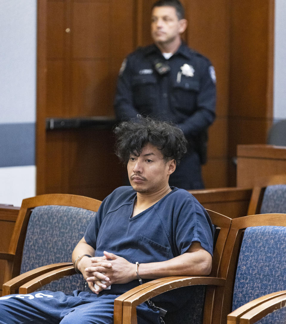 Yoni Barrios appears in court during a status check on the filing of a criminal complaint at the Regional Justice Center, on Tuesday, Oct. 11, 2022, in Las Vegas. Barrios is a suspect in a stabbing rampage on the Las Vegas Strip that left two people dead and six injured. (Bizuayehu Tesfaye /Las Vegas Review-Journal via AP)