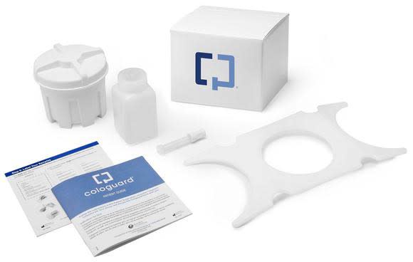 A Cologuard testing kit on top of a white surface