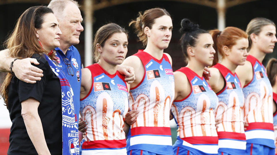 Western Bulldogs players line up wearing their Indigenous Round jerseys.