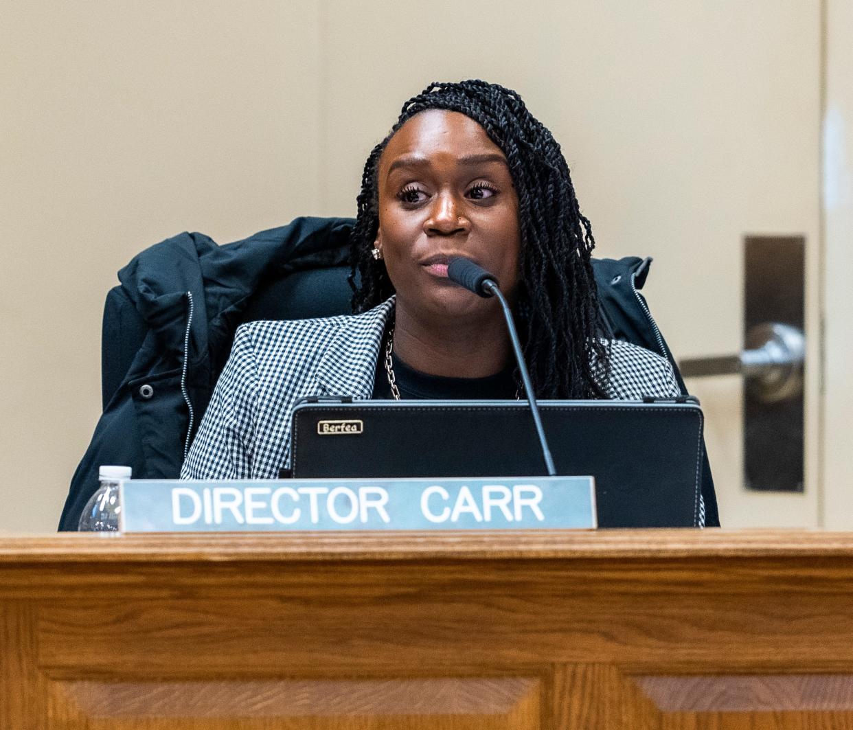 Aisha Carr, Milwaukee School Board Director for District #4, speaks at a board meeting in January. At a meeting April 18, community members showed up to support Carr as she believed board members were considering opening an investigation into her conduct.