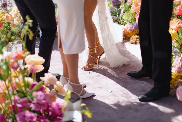 <p>Getty</p> Stock image of bride and groom greeting wedding guests