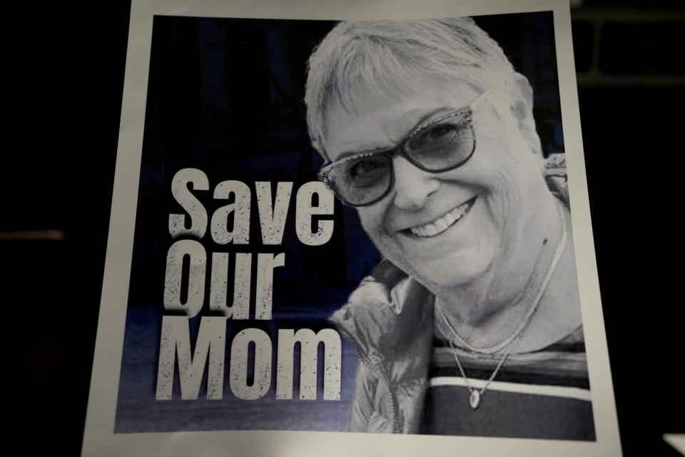 FILE - A poster of Ada Sagi, 75-year-old mother of Noam Sagi, is on display at a press conference of British children of Israeli hostages at a hotel in London, Thursday, Oct. 12, 2023. Noam Sagi, 53, is a London-based psychotherapist who grew up on Kibbutz Nir Oz. His 75-year-old mother, Ada Sagi, was taken hostage on October 7. Sharon Lifschitz, 52, is an artist and academic whose parents are peace activists aged 85 and 83 and were taken hostage too. (AP Photo/Kirsty Wigglesworth, File)