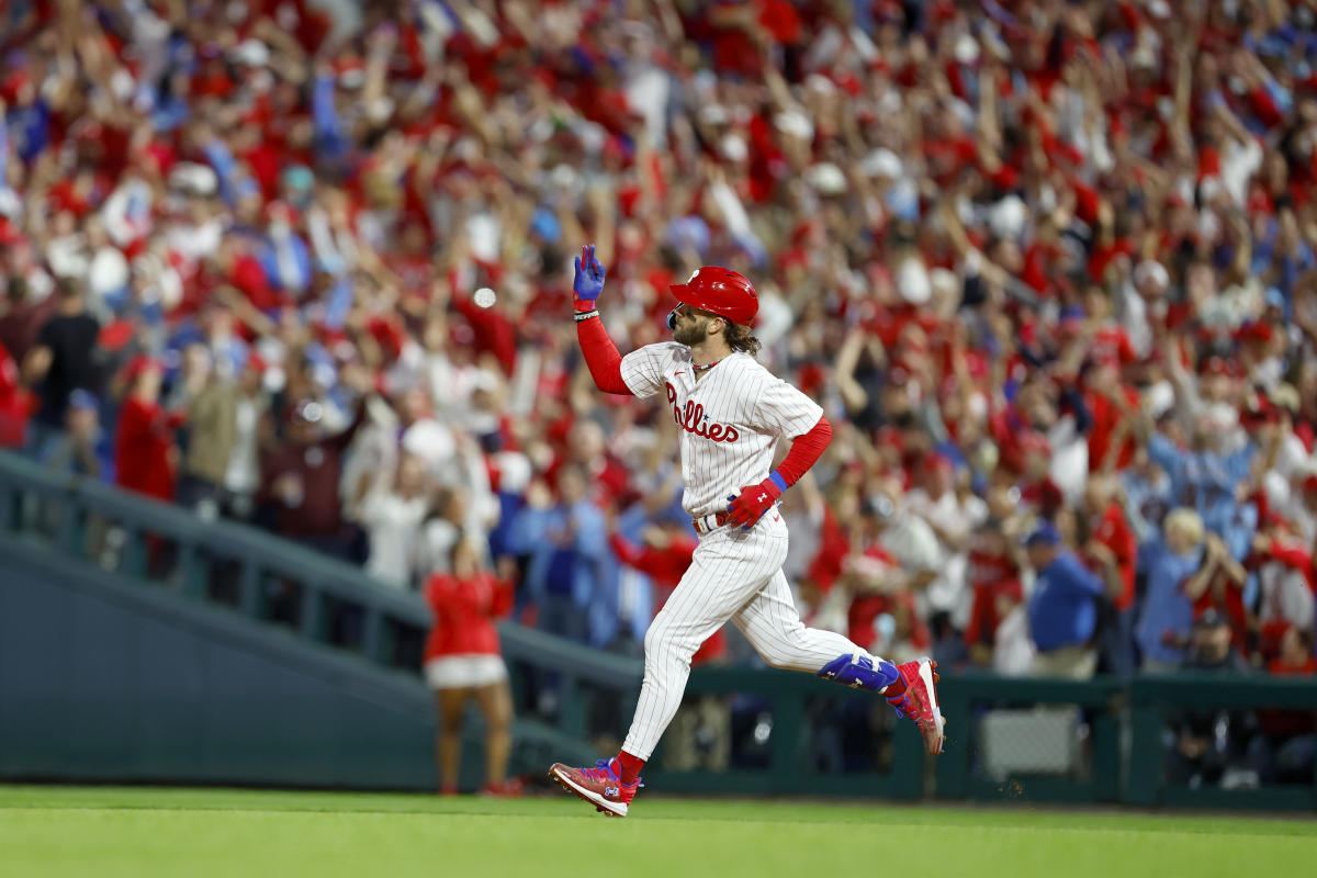 Phillies' Bryce Harper Signs His Helmet for a Young Fan After Being Ejected