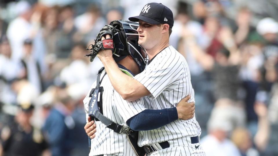 Apr 16, 2023; Bronx, New York, USA; New York Yankees starting pitcher Gerrit Cole (45) celebrates with catcher Jose Trevino (39) after pitching a complete game shutout to beat the Minnesota Twins 2-0 at Yankee Stadium.